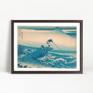 Fishing On Rugged Shore With Distant Mountain